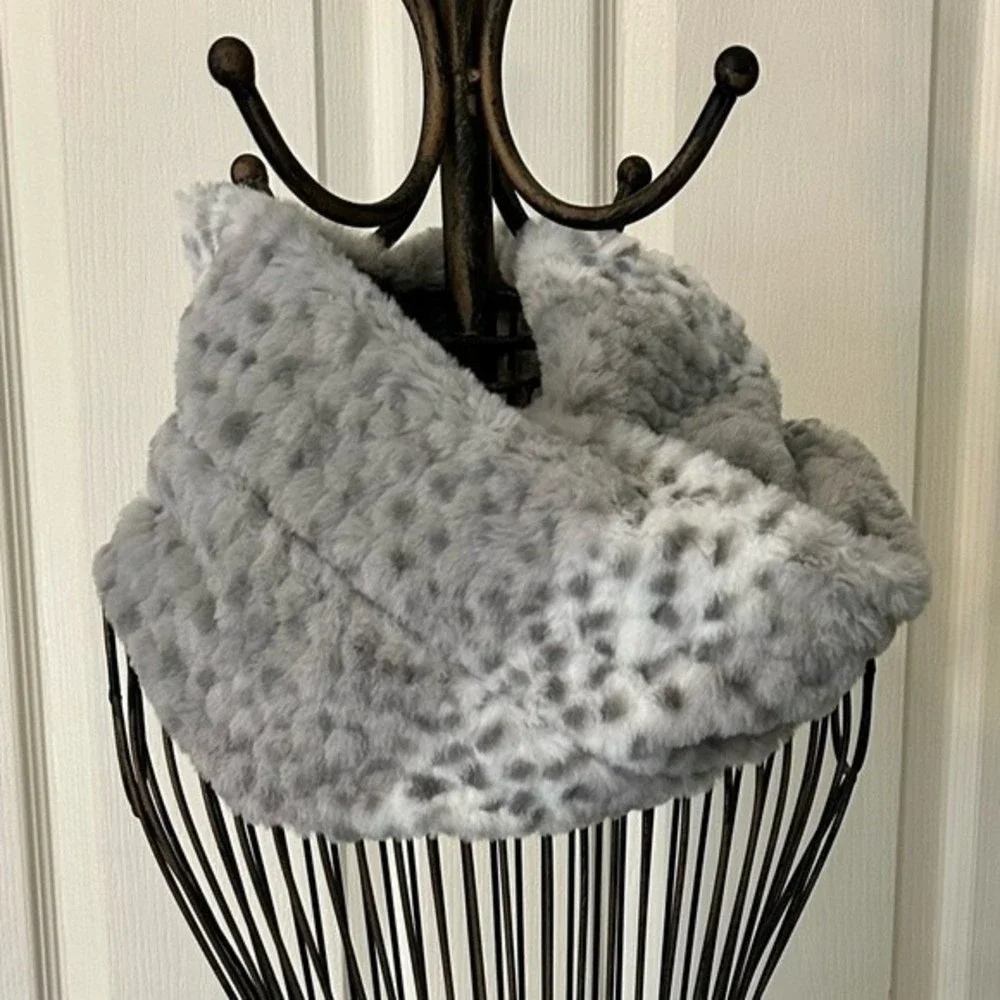 Faux fur infinity neck scarf for winter warmth. Gray and cream with animal spots